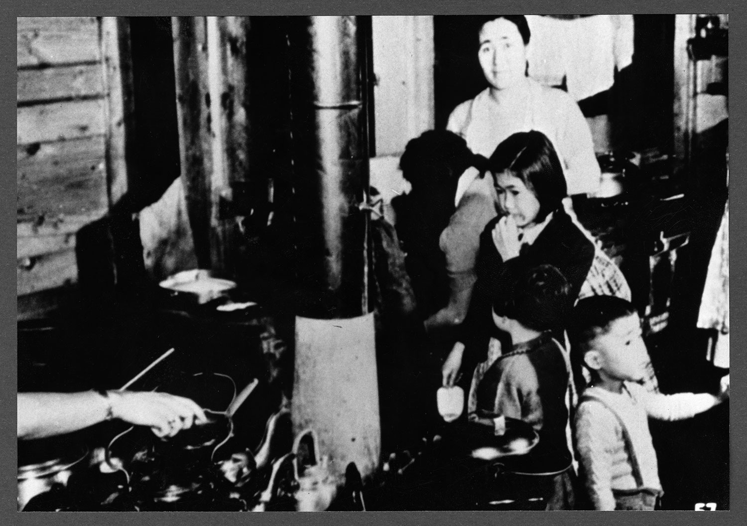 Japanese Canadians in an internment camp: Recto