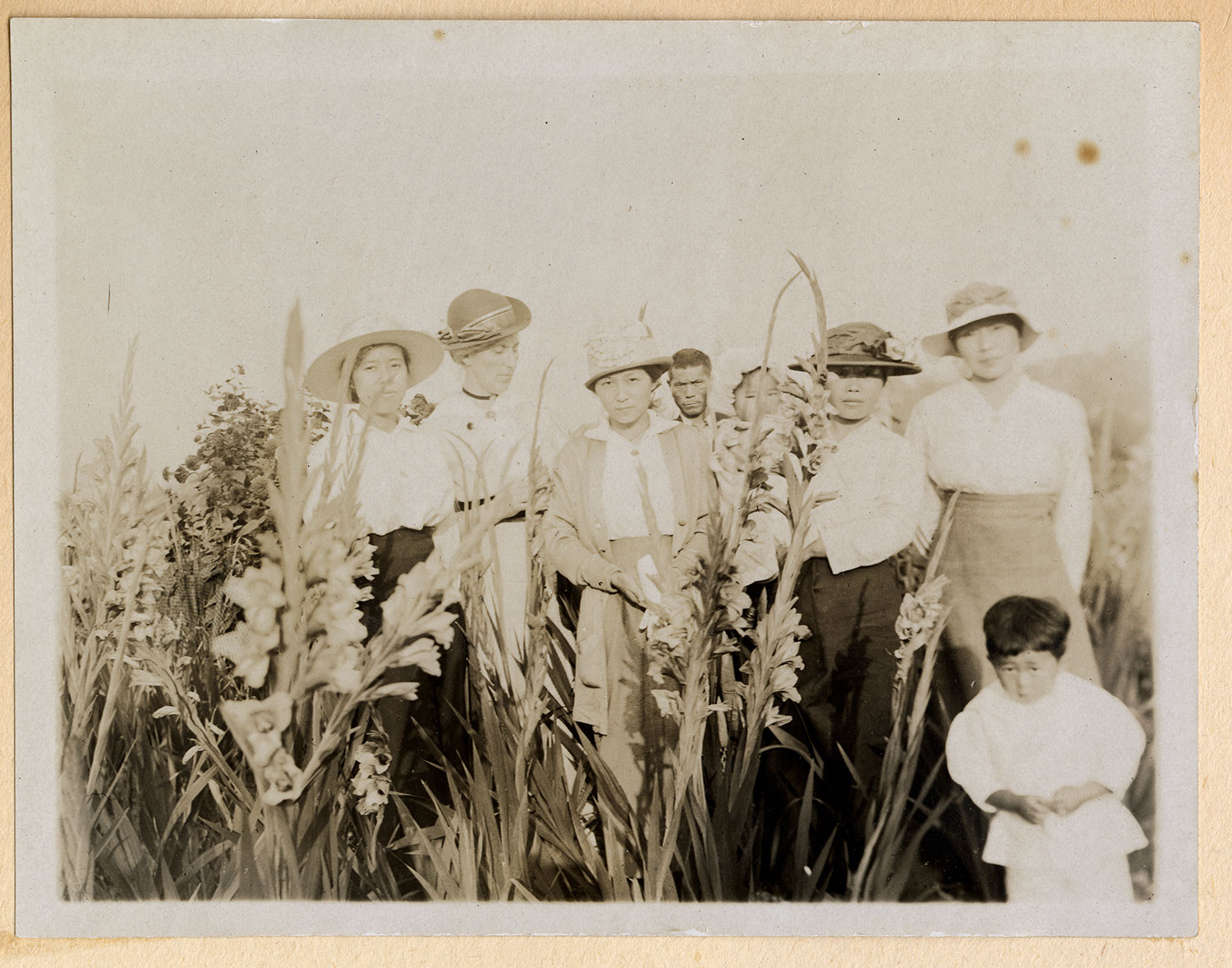 Jessie Howie with a group in the garden